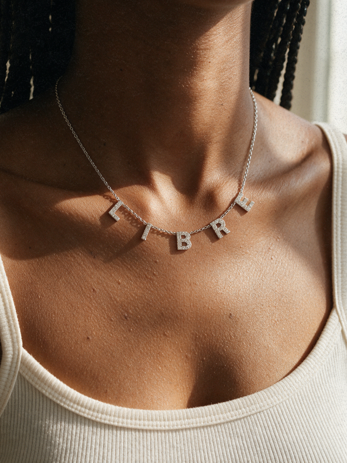 Libre · Collier symbolique personnalisable