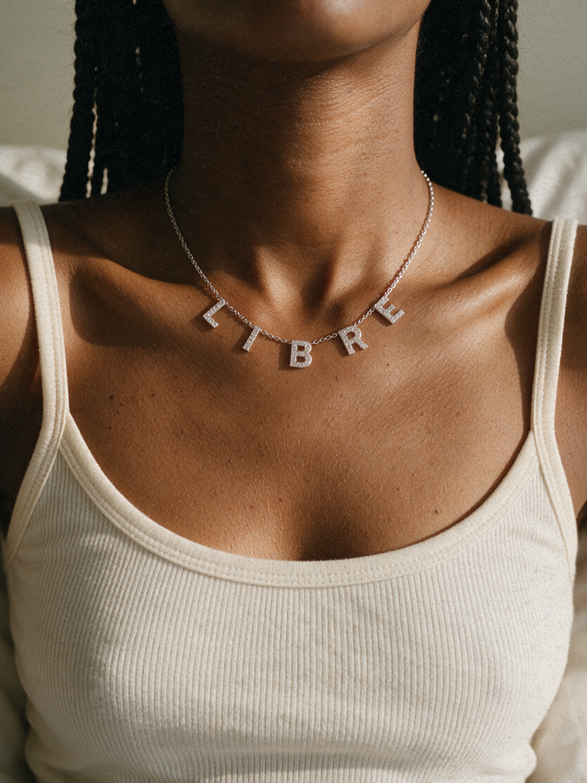 Libre · Collier symbolique personnalisable