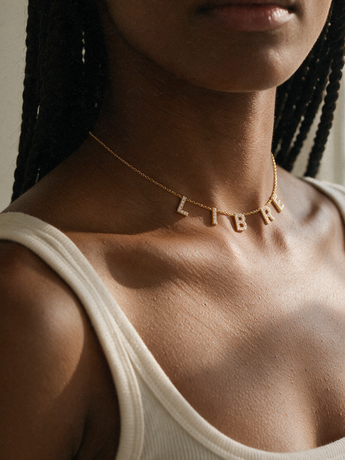 Libre · Collier symbolique personnalisable