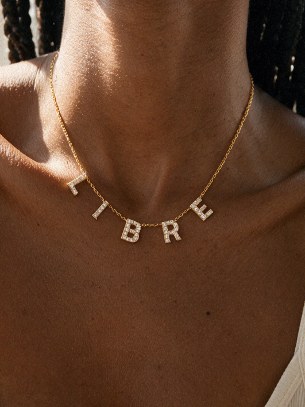 Libre · Collier symbolique personnalisable