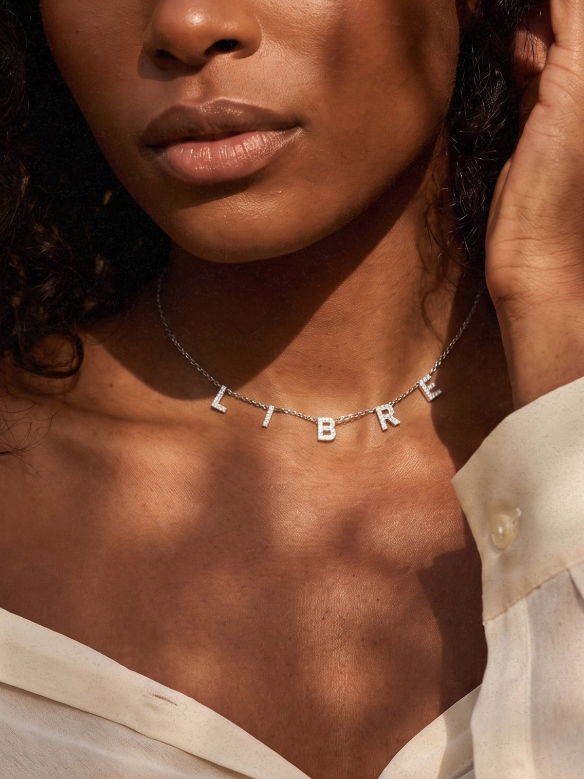 Libre · Collier symbolique personnalisable
